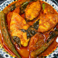Asam Pedas : Plat de poisson mijoté dans une sauce aigre-douce épicée à base de 