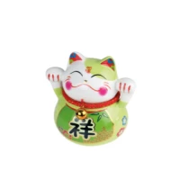 tirelire chat ceramique  k peint a la main 10 cm - vert